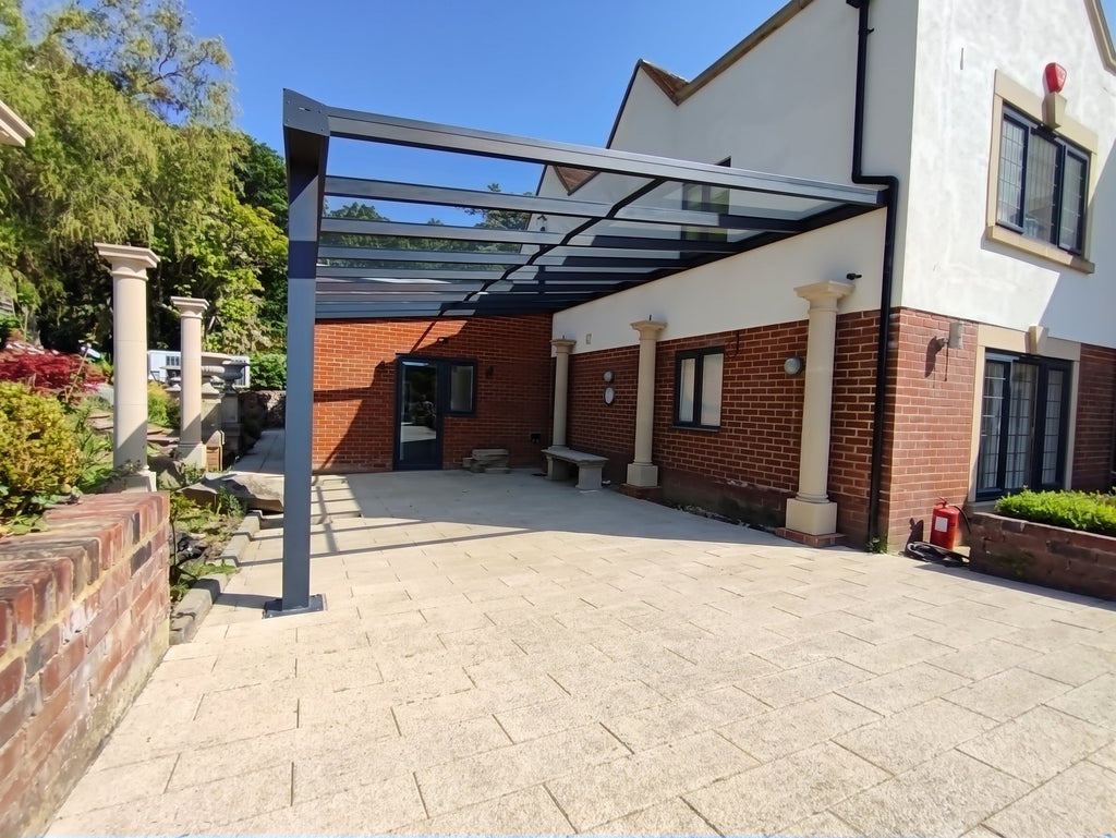 Lean - to wall carports